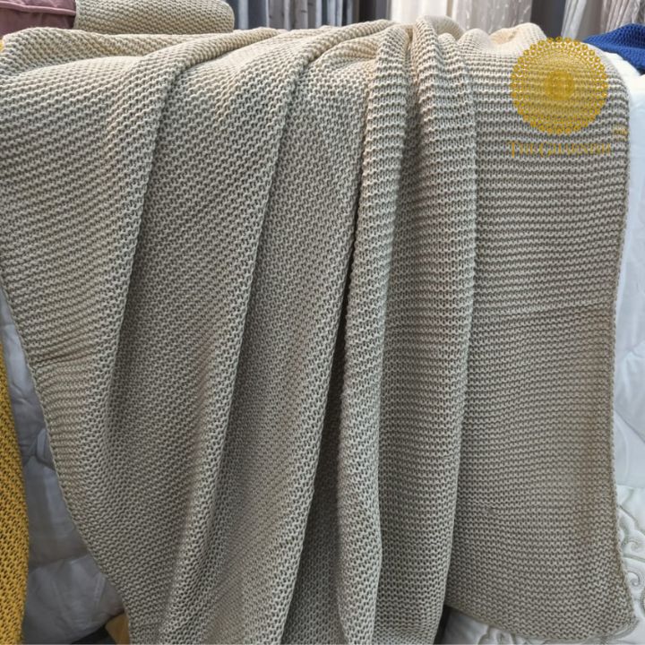 Wrapped in luxurious softness, these throws are knitted with precision to ensure a delicate balance between warmth and breathability. Whether you're curling up on the couch with a book, enjoying a movie night with loved ones, or simply seeking solace from the chilly weather, our throws offer the perfect companion.