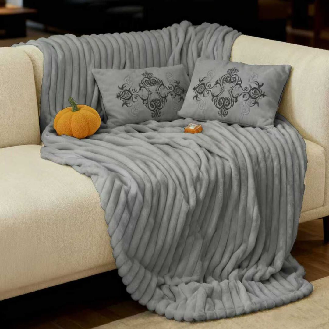 Luxury rabbit fur style blanket by The Gharnish, plush and warm winter blanket with designer soft, cozy texture for cold nights.