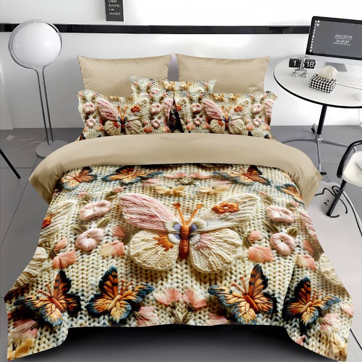 Bedding set with butterfly and floral patterns on a bed in a room setting.