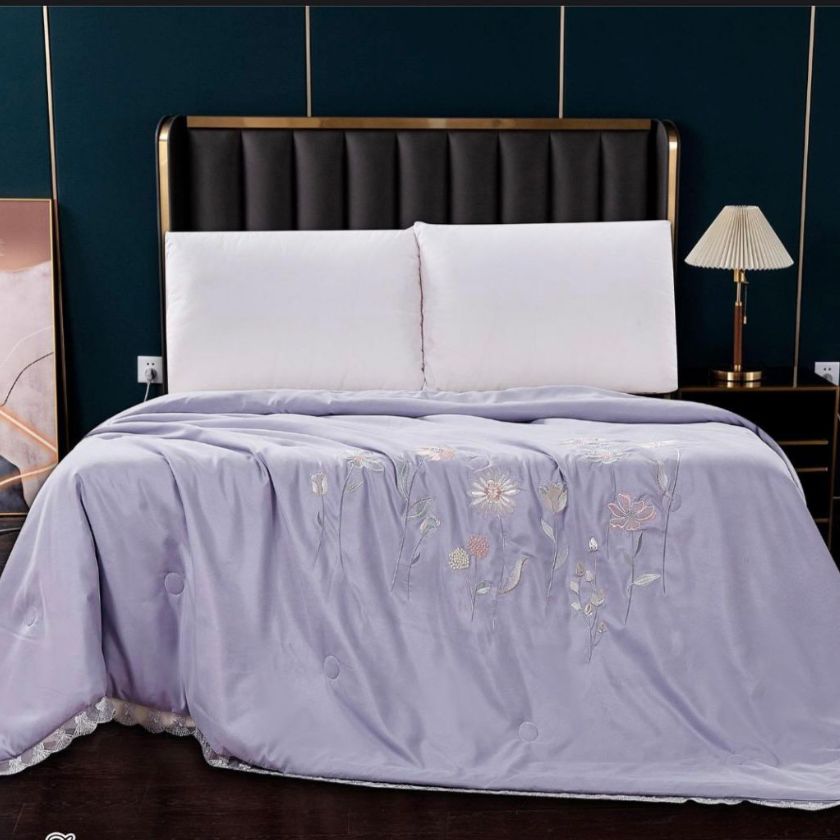 Indulge in ultimate comfort with our Solid Comforter, crafted with 100% super soft microfiber filling for a plush, cloud-like feel. Designed for both luxury and durability, it features exquisite embroidery and delicate lace detailing around the corners, adding a touch of elegance to your bedroom. Perfect for year-round coziness, this comforter blends warmth, style, and sophistication effortlessly.