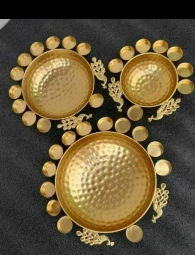 This Diwali decorate your home with a set of 5 peacock urli set