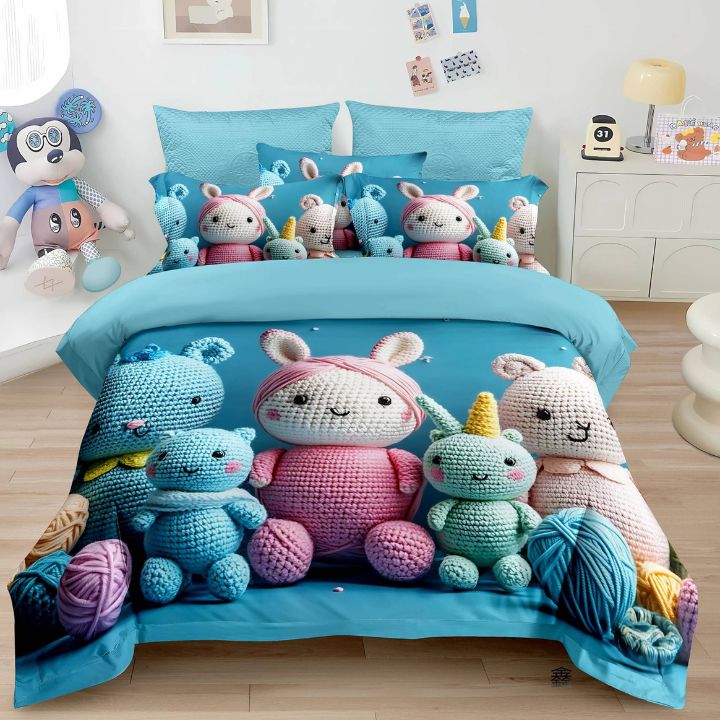 Bedding set with colorful crochet characters on a bed in a room.
