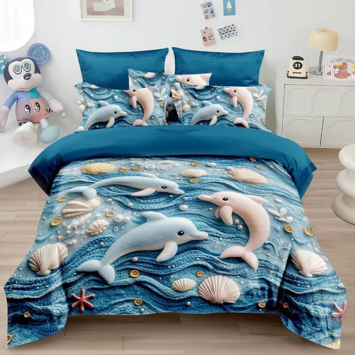 Bedding set with dolphin design on a bed in a room.