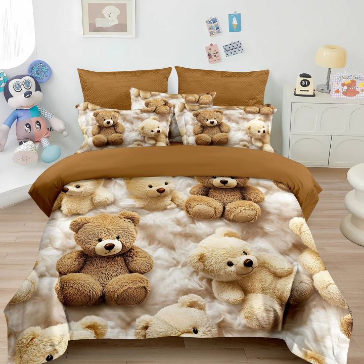Bedding set with teddy bear design on a bed in a room.