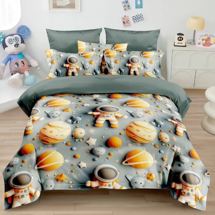 Space-themed bedding set with astronauts, planets, and stars on a bed in a room.
