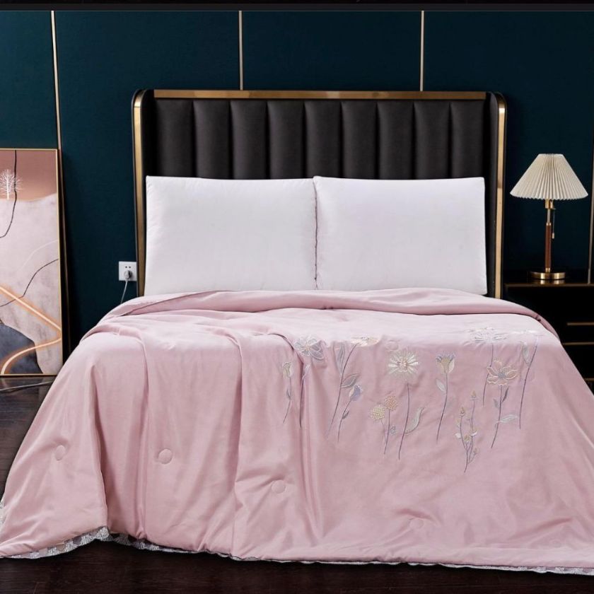 Indulge in ultimate comfort with our Solid Comforter, crafted with 100% super soft microfiber filling for a plush, cloud-like feel. Designed for both luxury and durability, it features exquisite embroidery and delicate lace detailing around the corners, adding a touch of elegance to your bedroom. Perfect for year-round coziness, this comforter blends warmth, style, and sophistication effortlessly.