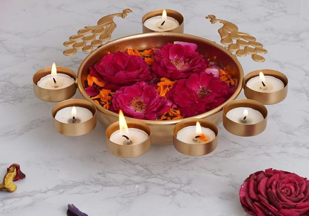 This Diwali decorate your home with a set of 5 peacock urli set