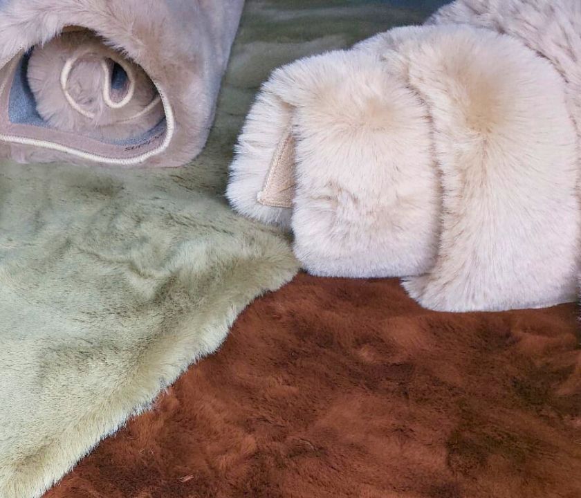 This Carpet made from high-quality faux rabbit fur, which offers an incredibly soft and plush texture. This material mimics the feel of real rabbit fur, providing a luxurious and cozy touch to your bedroom or any other area of your home.