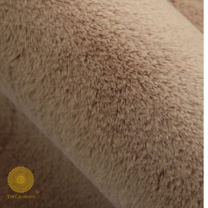 This Carpet made from high-quality faux rabbit fur, which offers an incredibly soft and plush texture. This material mimics the feel of real rabbit fur, providing a luxurious and cozy touch to your bedroom or any other area of your home.