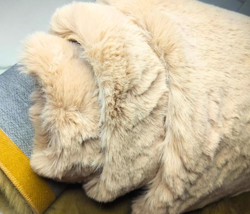 This Carpet made from high-quality faux rabbit fur, which offers an incredibly soft and plush texture. This material mimics the feel of real rabbit fur, providing a luxurious and cozy touch to your bedroom or any other area of your home.