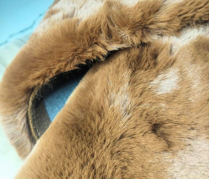 This Carpet made from high-quality faux rabbit fur, which offers an incredibly soft and plush texture. This material mimics the feel of real rabbit fur, providing a luxurious and cozy touch to your bedroom or any other area of your home.