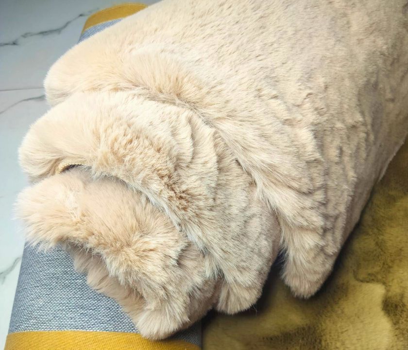 This Carpet made from high-quality faux rabbit fur, which offers an incredibly soft and plush texture. This material mimics the feel of real rabbit fur, providing a luxurious and cozy touch to your bedroom or any other area of your home.