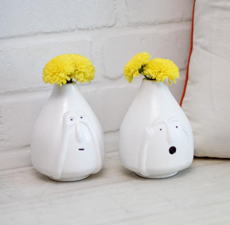 Set of two ceramic vases featuring facial features, by The Gharnish, decorative facial feature ceramic vase set for home decor.