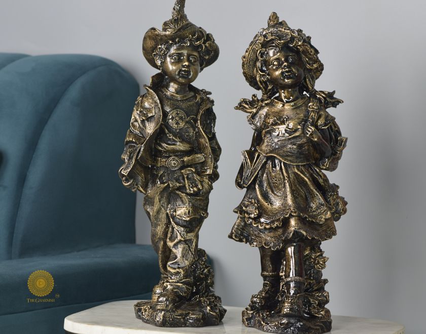 Antique gold abstract walking couple figurines by The Gharnish, 5x15 inches each, showcasing elegant, artistic sculpture details.