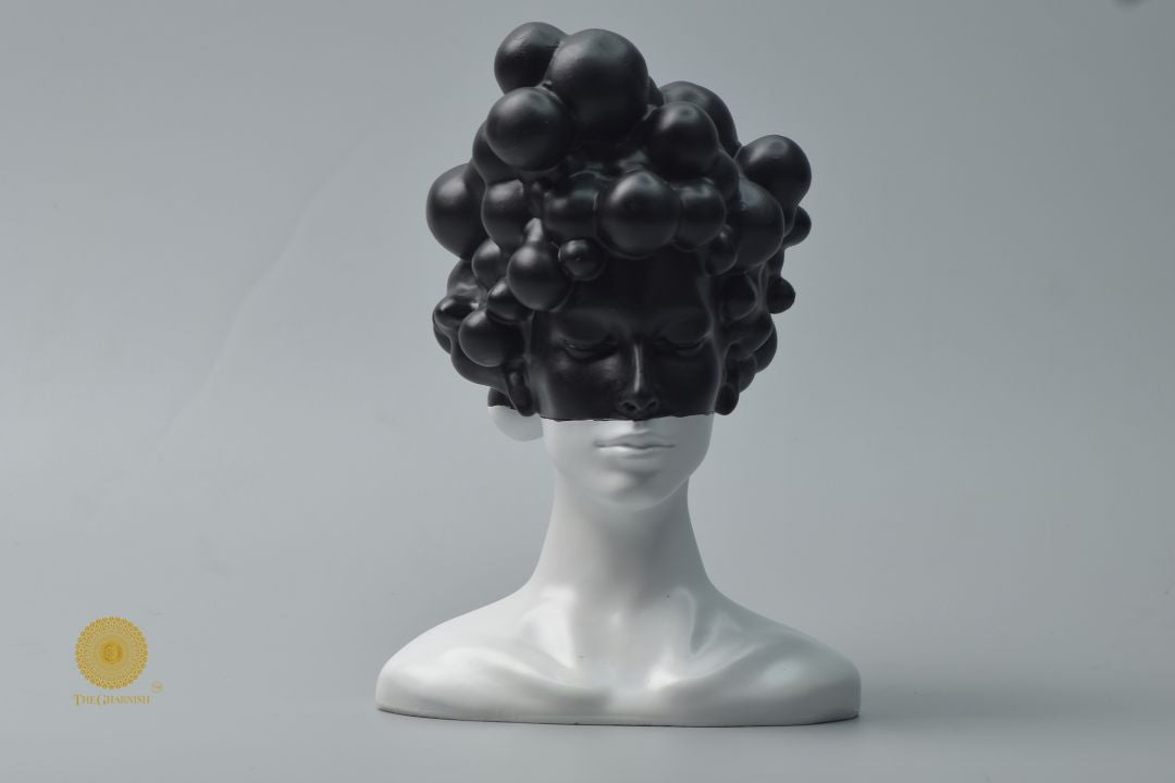 Black modern abstract lady face statue by The Gharnish, stylish ceramic figurine with sleek, contemporary design.