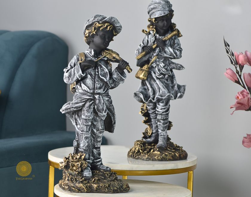 Elegant antique musical couple statue by The Gharnish, abstract figurines capturing a romantic dance in detailed craftsmanship.