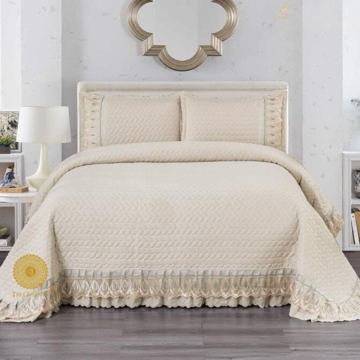 Astria Premium quilted and laced bedcover by The Gharnish, featuring intricate quilting and elegant lace details on a bedding set.