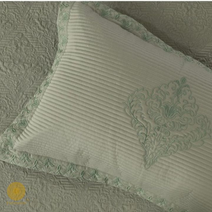 Estorado Premium Cotton Quilted Bedcover by The Gharnish, featuring a soft, textured quilted bedding design in neutral tones.