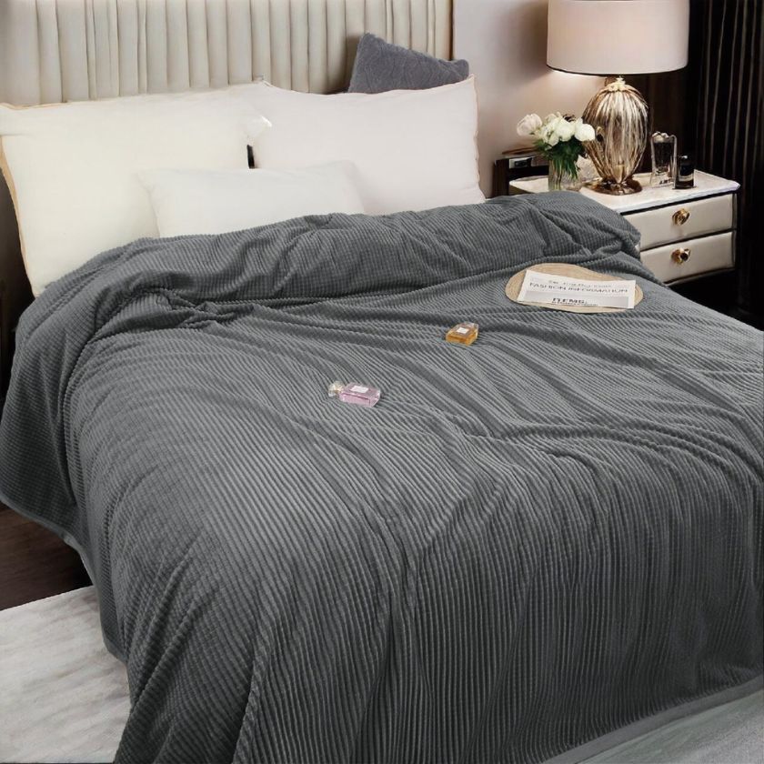 Double bed AC blanket by The Gharnish, soft and cozy blanket draped over a bed, perfect for cooling comfort during warm nights.