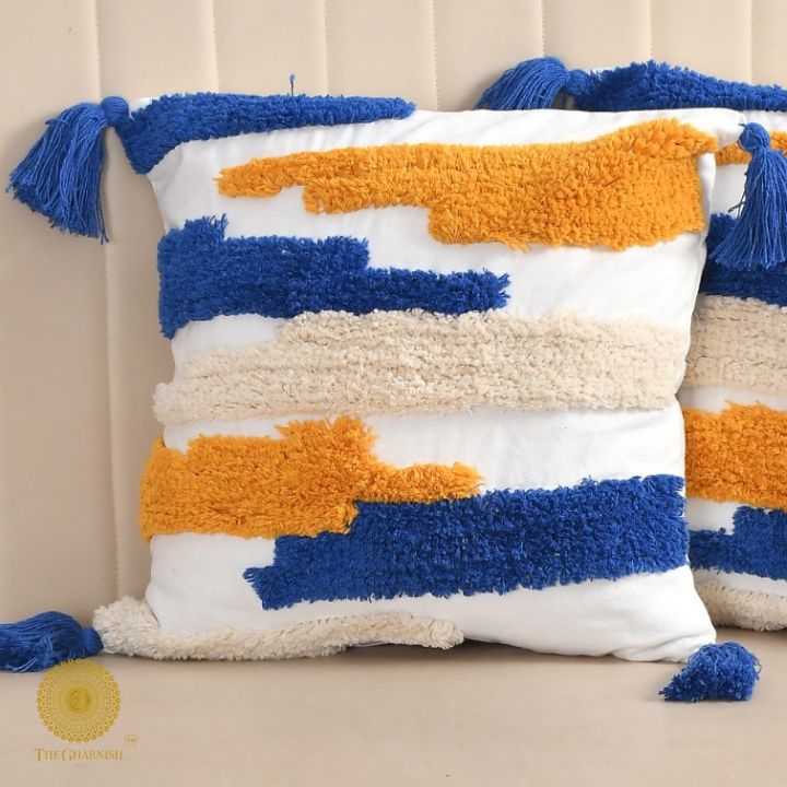 Set of two multicolor tufted cushion covers from The Gharnish, featuring vibrant, textured fabric for stylish home decor.