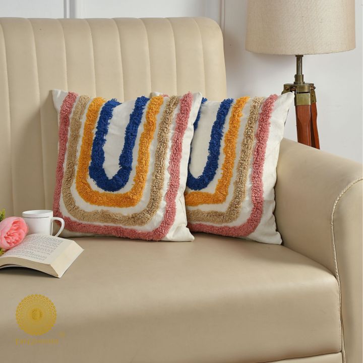 Set of 2 multicolor woven design cushion covers by The Gharnish, showcasing vibrant patterns and textured fabric for home decor.