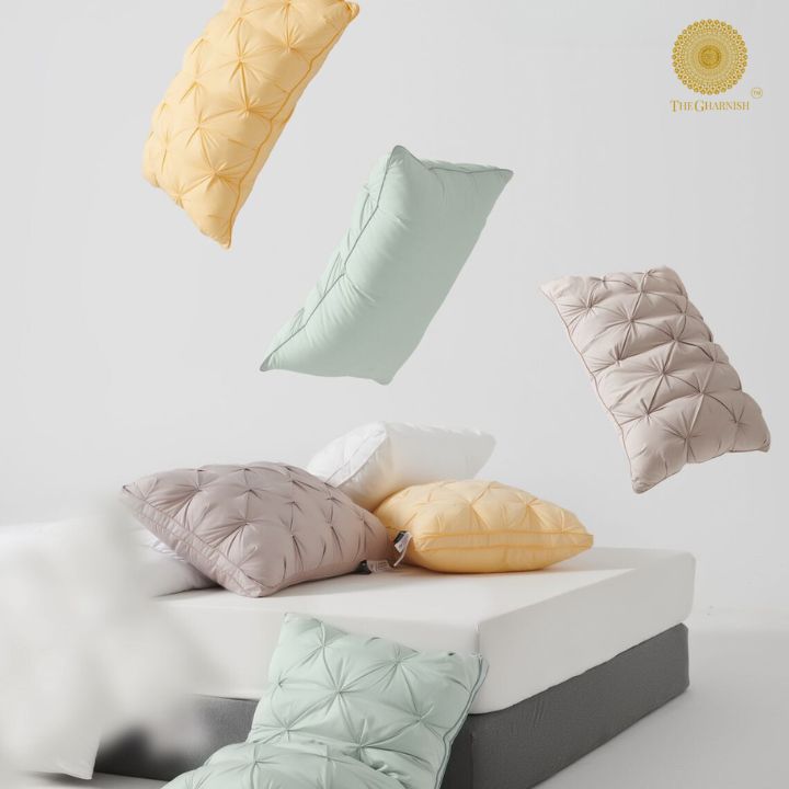 Pair of white feathery super soft cushions from The Gharnish, showcasing plush, comfortable throw pillows for cozy home decor