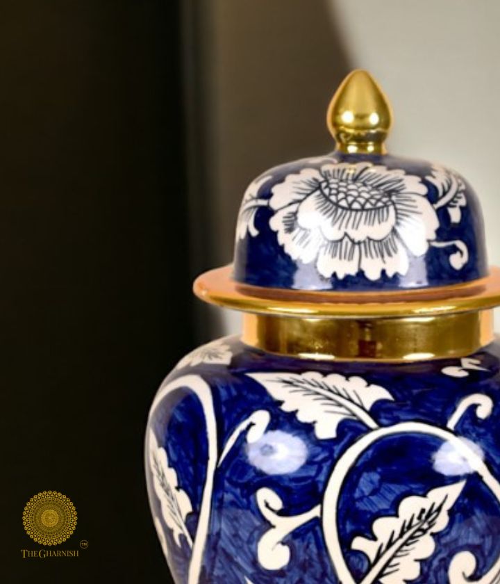 Decorated ceramic vases including a tabletop temple and ginger jar by The Gharnish, featuring intricate patterns and vibrant colors.