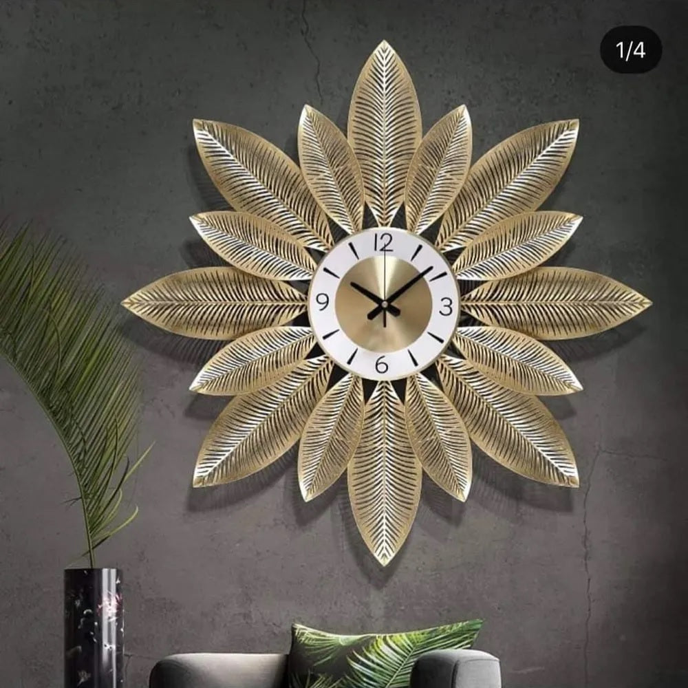 Golden flower and leaf design wall clock by The Gharnish, 30-inch diameter, decorative wall clock with floral motif.