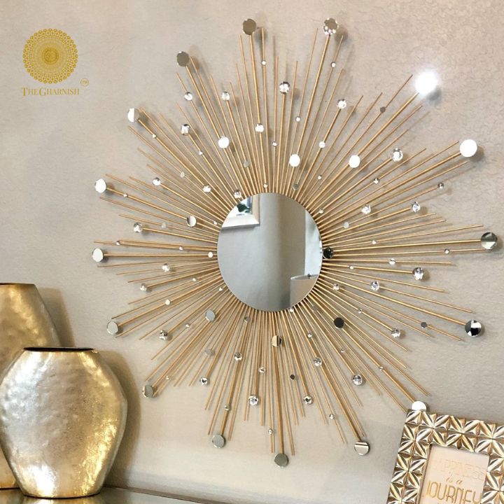 Silver wall mirror with sprinkled rays design, 30-inch diameter, by The Gharnish, showcasing a stylish and reflective home decor piece.