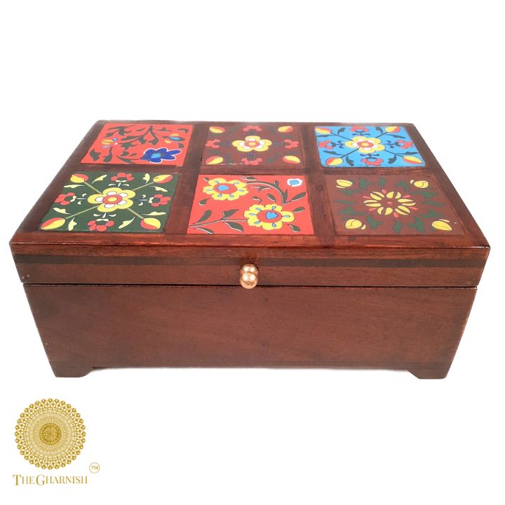 Multicolor wooden jewellery box from The Gharnish featuring a decorative wooden design with multiple compartments.