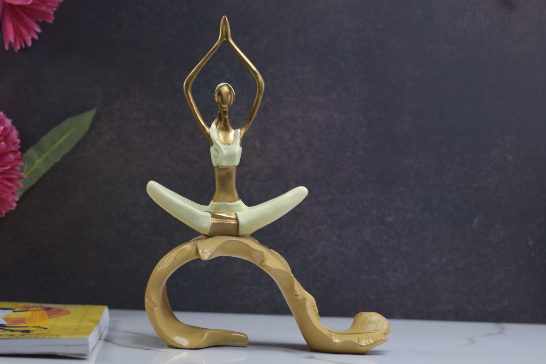 Ceramic figurine of a yoga practicing lady sitting on a banana leaf, crafted by TheGharnish, detailed and artistic decorative piece.