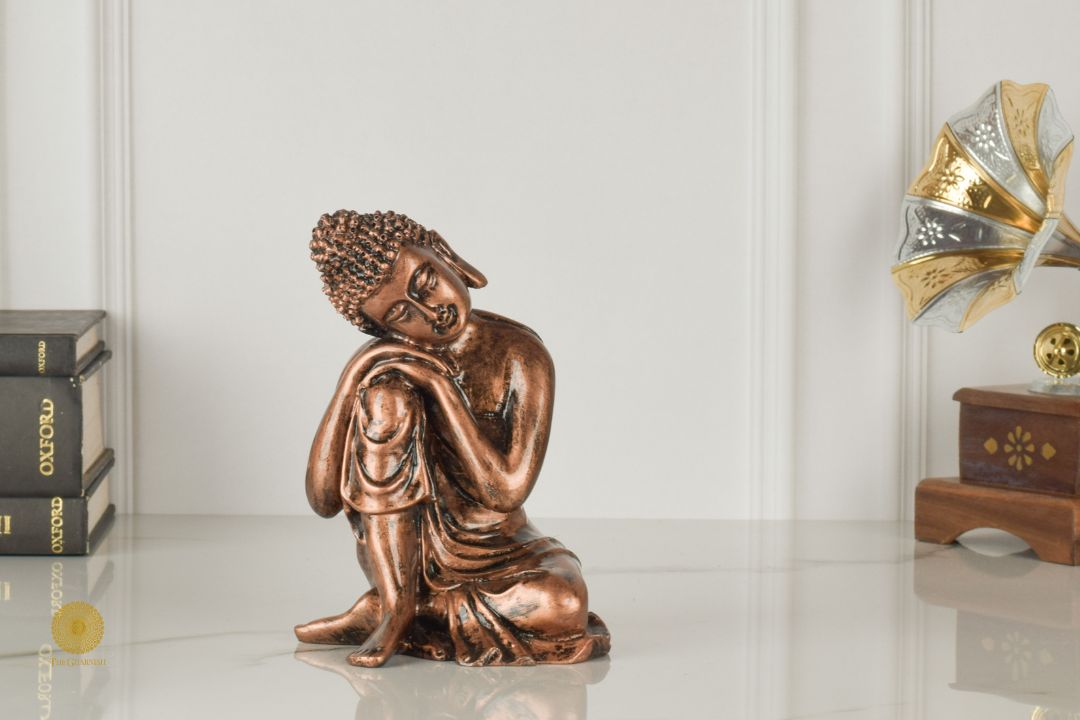 Resting Buddha gods figurine by TheGharnish, detailed showpiece sculpture of a serene resting Buddha for home decor.