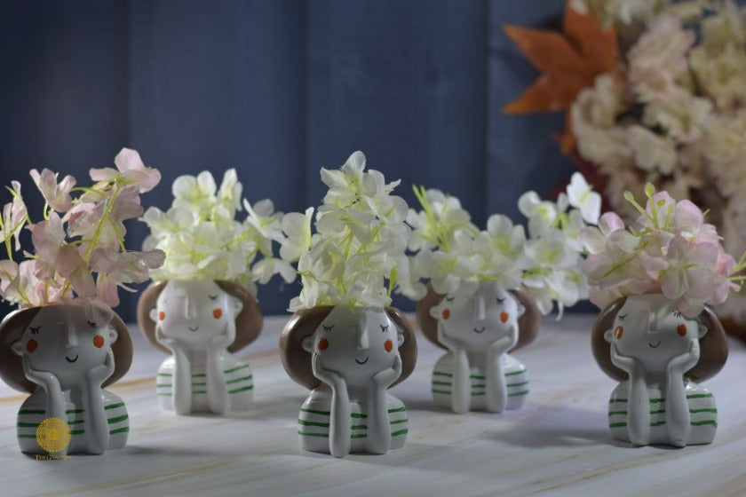 Miniature cute girl face planter by TheGharnish featuring a charming face and small plant holder, perfect for tabletop decor.