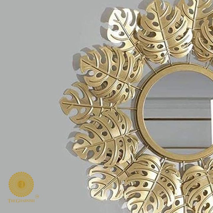 Spectacular metallic leaf wall mirror by TheGharnish, 24-inch decorative wall mirror with intricate leaf design.