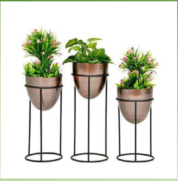 Set of three egg-shaped metallic planters in 26, 22, and 18 inches from TheGharnish, featuring shiny, modern garden decor.