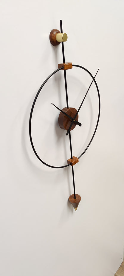 Large wooden wall clock by The Gharnish, modern metal design, decorative timepiece for living room wall.