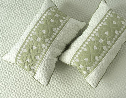 Luxury quilted embroidered bedding bedcover set by The Gharnish, five-piece set with intricate stitching and decorative embroidery.