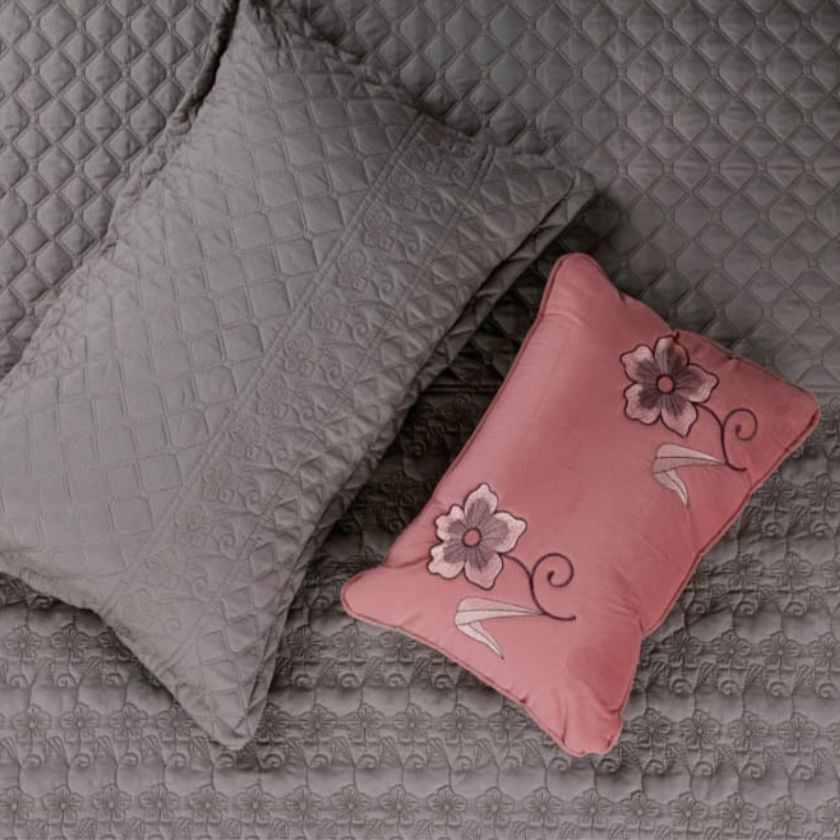 Luxurious Flora 6-piece wedding bedding set by The Gharnish with elegant floral design on soft fabric.