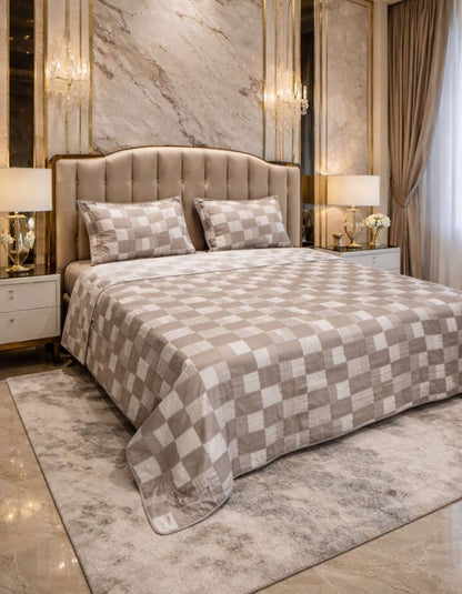 Lightweight reversible jacquard quilted king size bedcover from The Gharnish, showcasing elegant patterns and soft fabric.