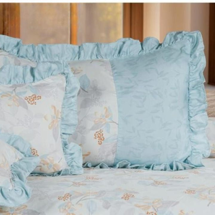 Serenity Bloom quilted 5-piece bedcover set by The Gharnish featuring floral bedding with intricate quilting details.