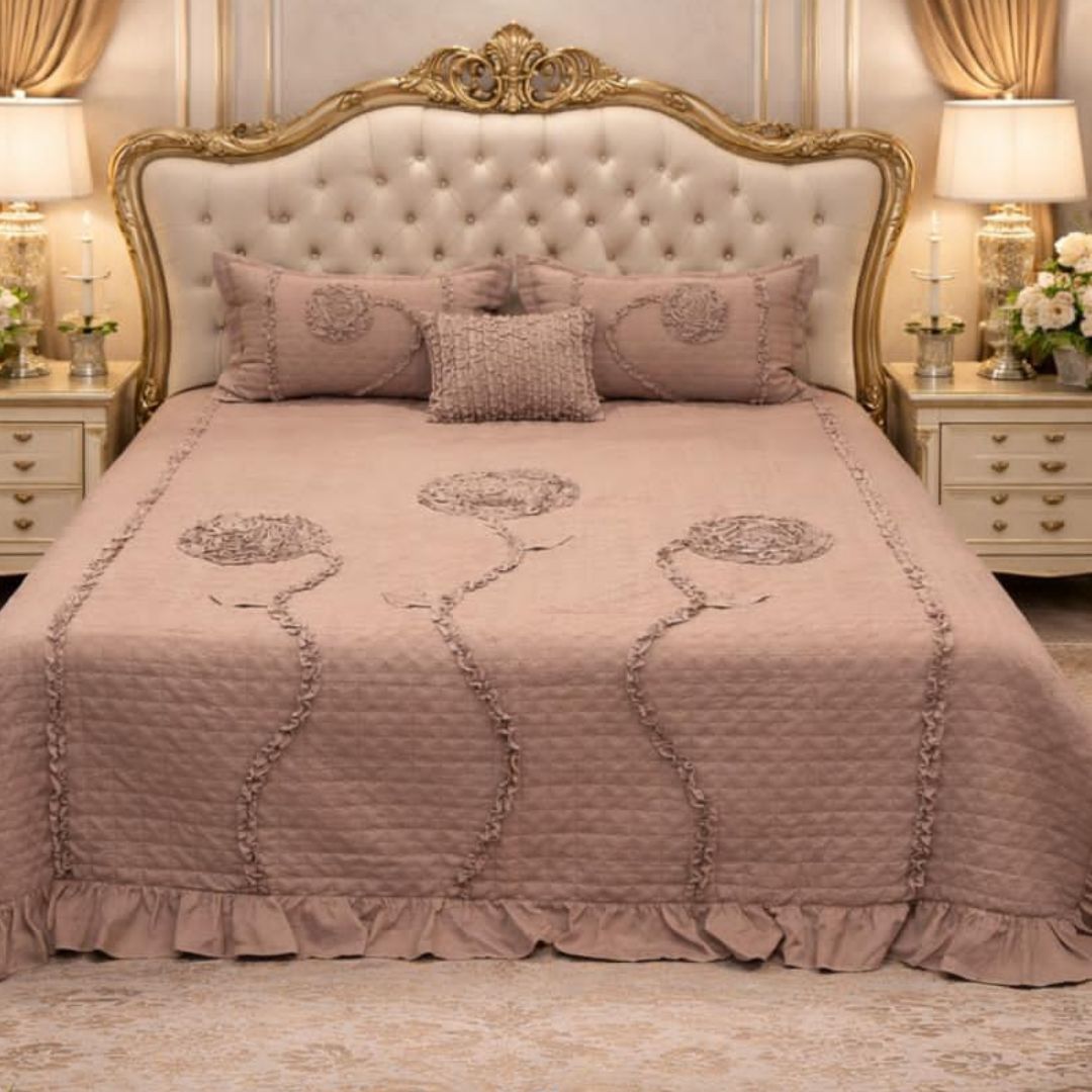 Ivory leaf design handwork super designer king size quilted bedcover from The Gharnish, showcasing intricate leaf embroidery on bedding.