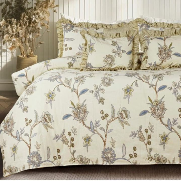 Serenity Bloom quilted 5-piece bedding set by The Gharnish featuring floral patterns and soft fabric for a stylish bedroom look.