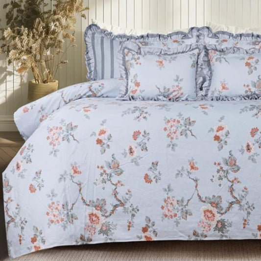 Serenity Bloom quilted bedcover set with five bedding pieces featuring floral patterns and soft fabric from The Gharnish.