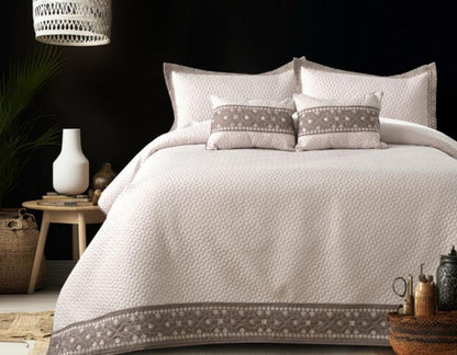 Luxury quilted embroidered bedding set by The Gharnish, includes 5 pieces with intricate design and plush fabric for elegant bedroom decor.