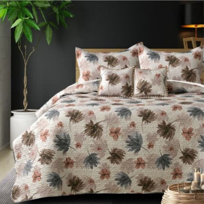Premium imported 5-piece quilted bedding set by The Gharnish, featuring soft, decorative bedcovers and matching pillow shams.