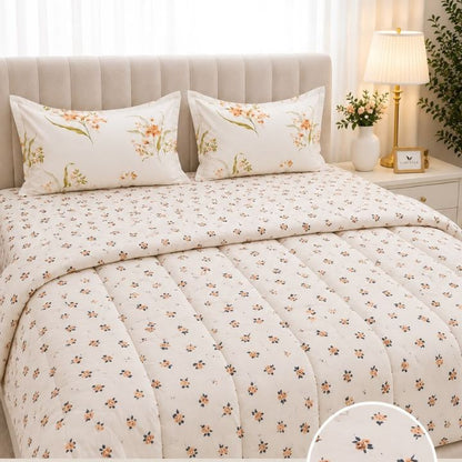 The Gharnish Boutique-Fit 4-piece king size comforter set with elegant bedding and decorative pillows on a neatly made bed.