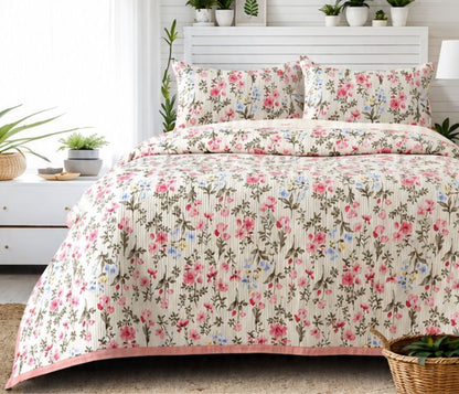 Soft floral bedding set by The Gharnish, includes quilted bedcover and two matching pillow covers for a cozy bedroom look.