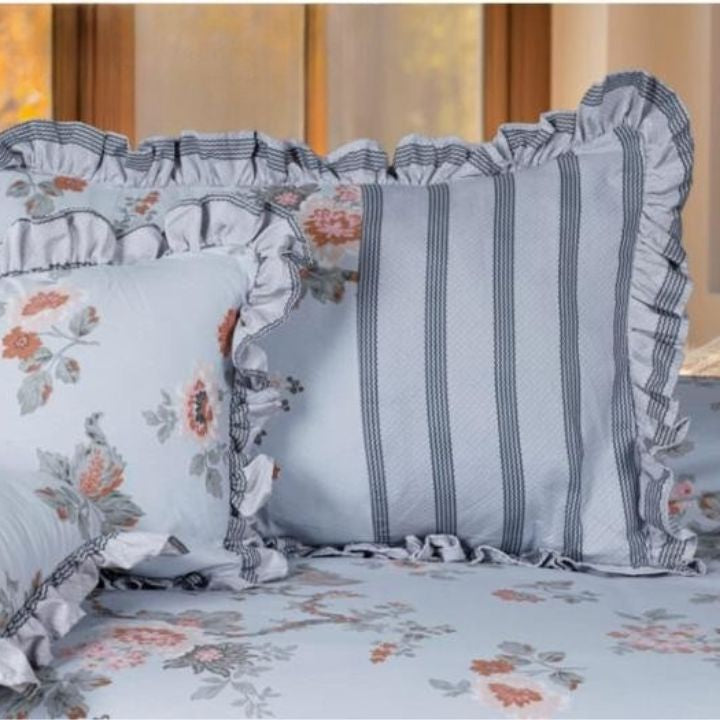 Serenity Bloom quilted 5-piece bedding set by The Gharnish with floral patterns and soft fabric for a cozy bedroom decor.