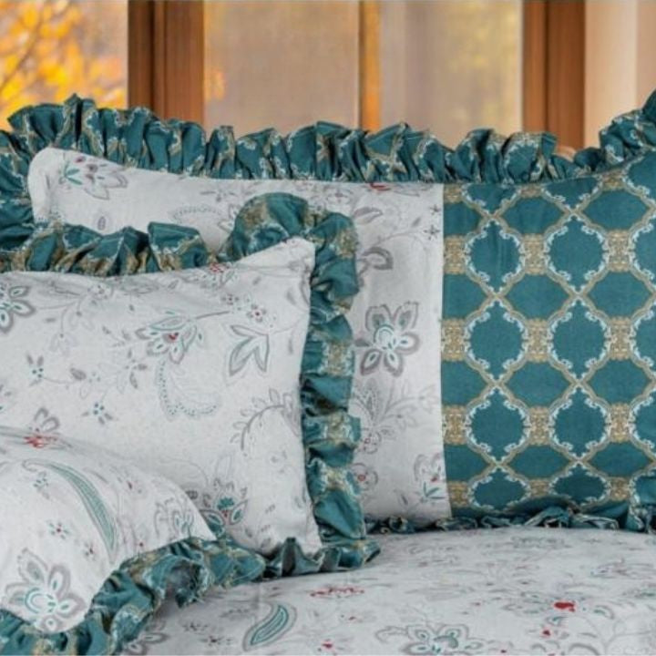 Serenity Bloom quilted 5-piece bedding set by The Gharnish featuring floral patterns and soft fabric for a cozy bedroom look.