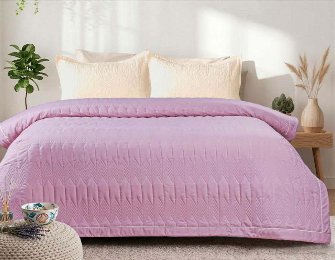 Lightweight luxury comforter from The Gharnish, all-season bedding with soft fabric and cozy warmth for year-round comfort.